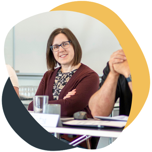 Smiling woman on MBTI event in AI adoption